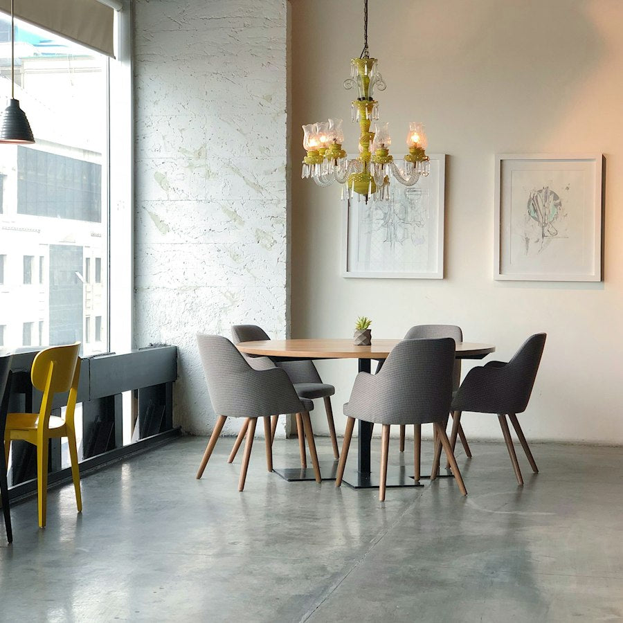 Dining room furnished with wooden and upholstered furniture